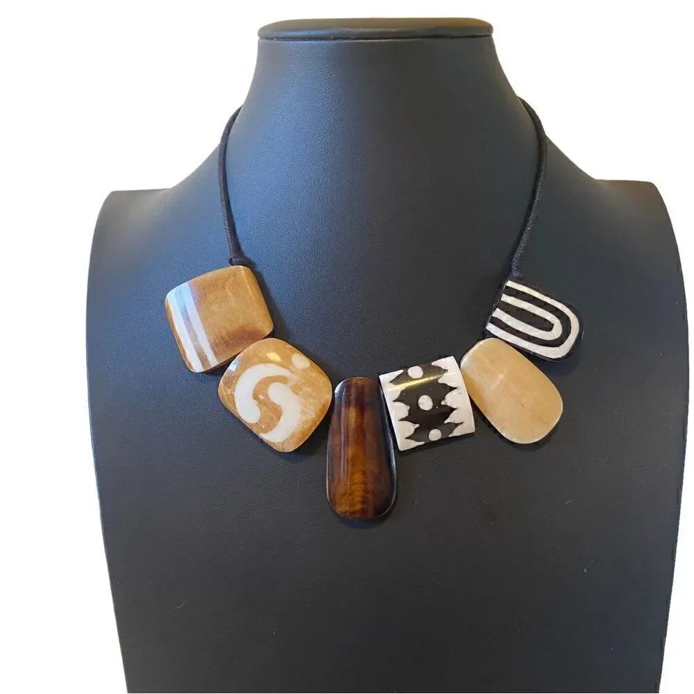 Six Piece Stone Tribal Looking Necklace on Black Adjustable Slide Cord.